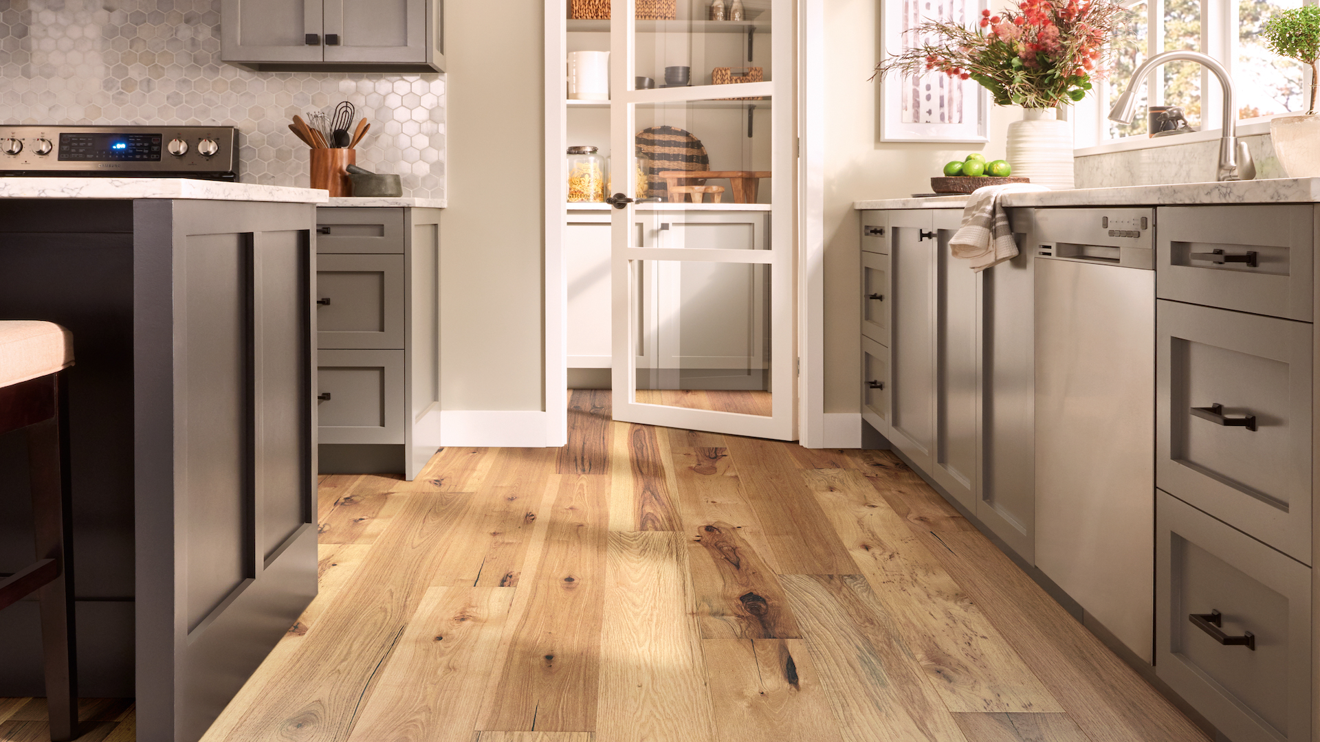 rustic hardwood flooring in a bright kitchen